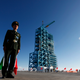 A soldier stood guard beside the Long March-2F rocket, loaded with China’s unmanned space module Tiangong-1, the day before its launch.